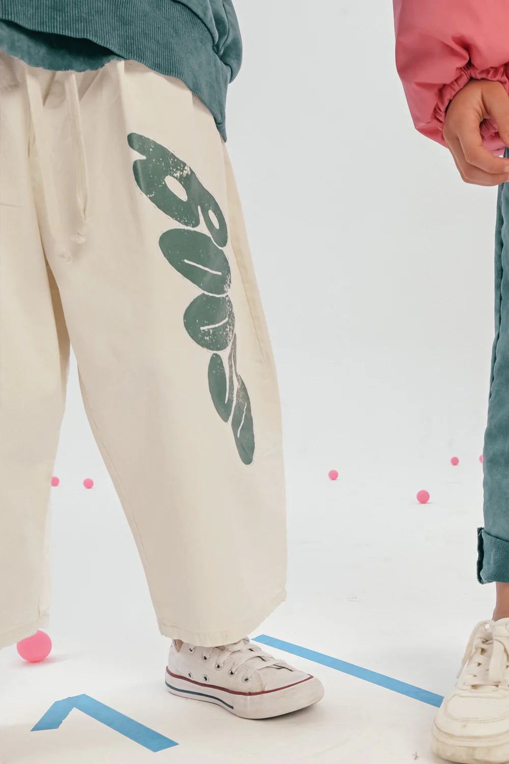 White culotes pants with green detail