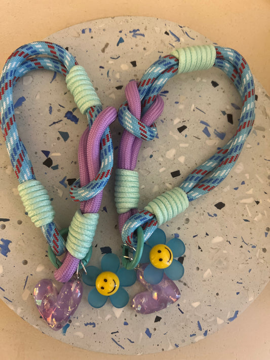 Blue bag charm with purple heart & flower smiley
