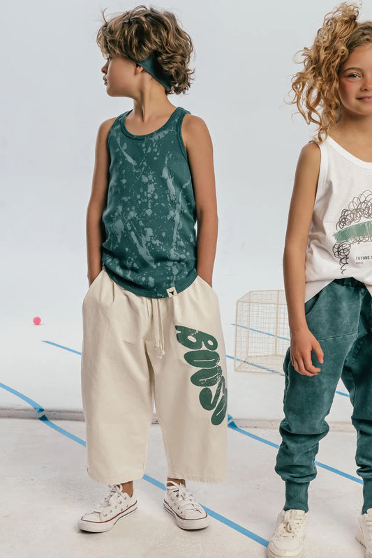 White culotes pants with green detail